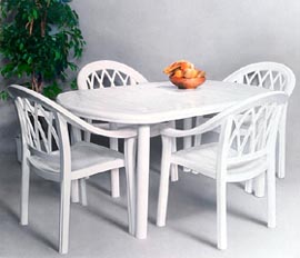 Promotional Photography of a table and 4 chairs, but only one chair was available, by John Neville Cohen